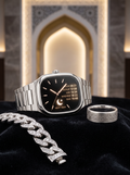 Sovereign cushion-shaped silver-tone watch, stone-set bracelet and geometric ring concept. Steel grade, diamonds and working prayer alerts are unverified.